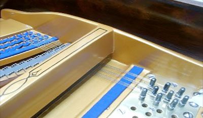 Bluthner Grand Piano during stringing